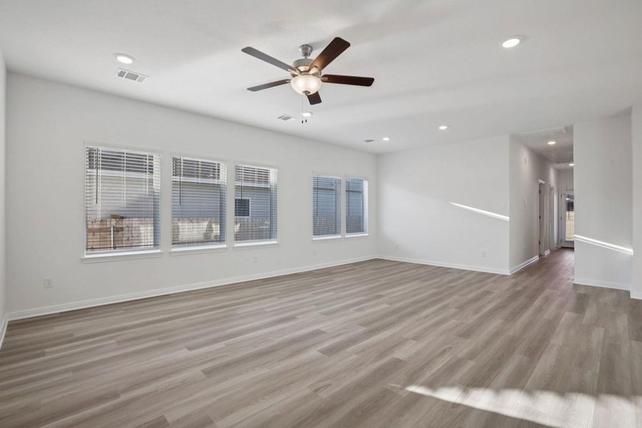 Unfurnished room featuring light wood-type flooring, recessed lighting, and a ceiling fan