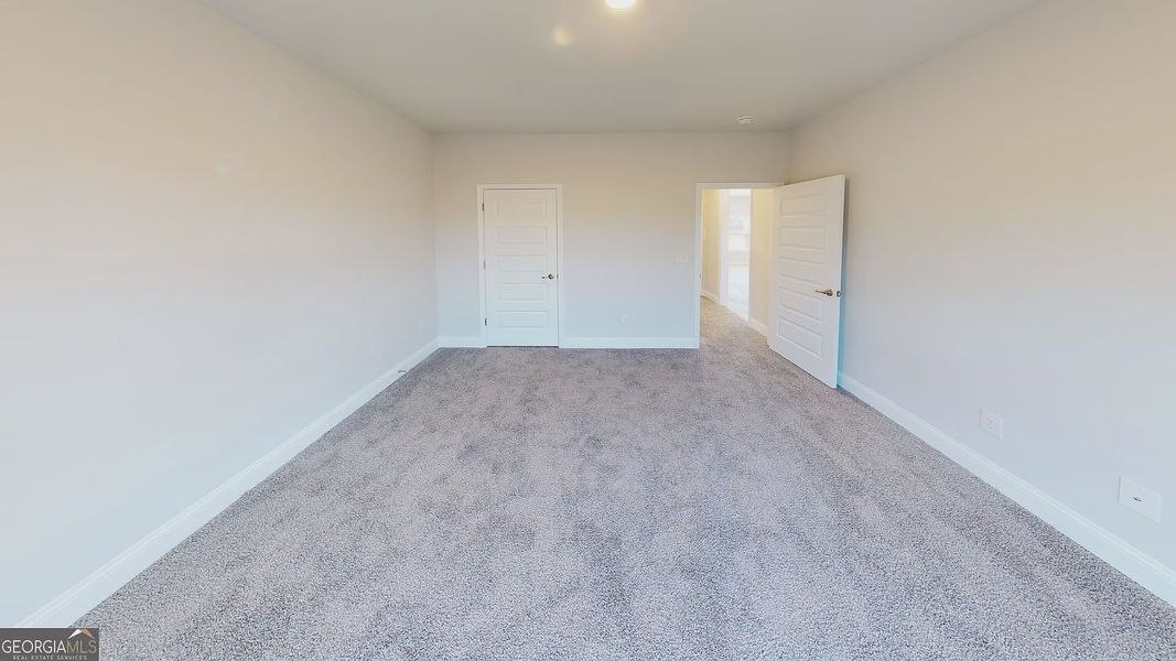 Spacious, unfurnished interior of a new home in Holliday Pass, Griffin (Image 18).