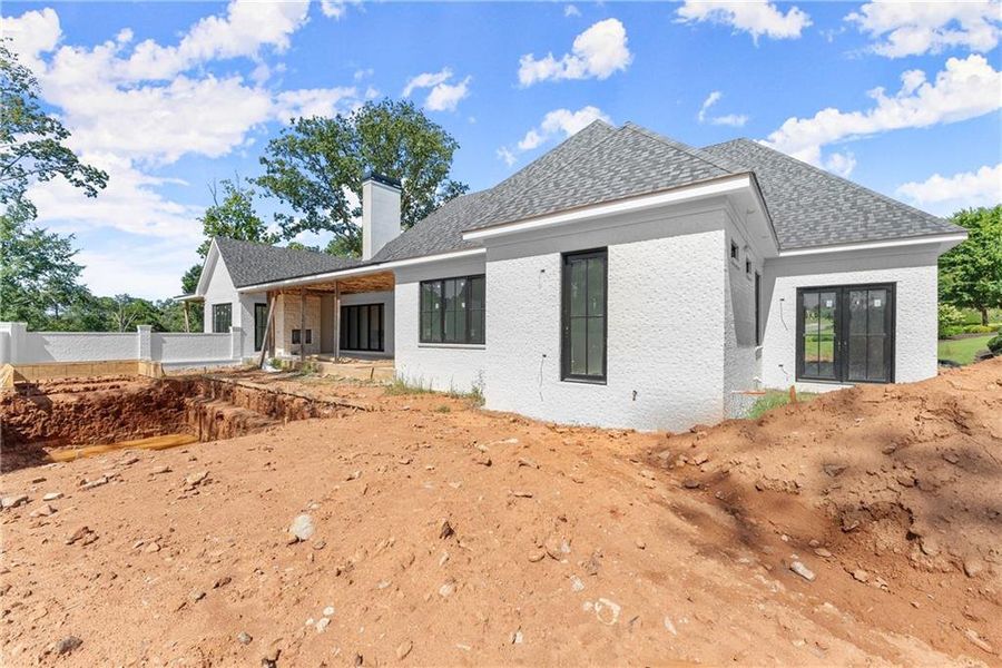 Front exterior of a new home in , Alpharetta, GA, highlighting curb appeal (Image 10).