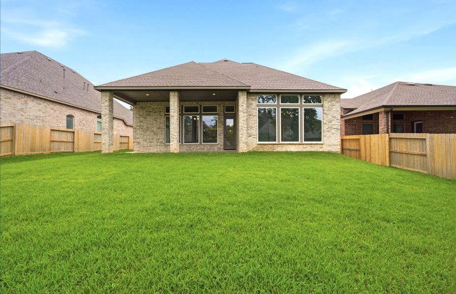Exterior details and patio area of a home in The Woodlands Hills 65′, Willis (Image 25). Exterior details and patio area of a home in The Woodlands Hills 65′, Willis (Image 25).