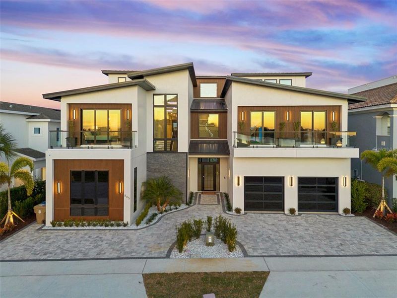 Front exterior of a new home in , Reunion, FL, highlighting curb appeal (Image 2). Front exterior of a new home in , Reunion, FL, highlighting curb appeal (Image 2).