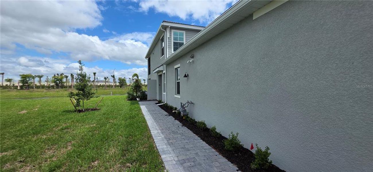 Exterior details and patio area of a home in Calusa Country Club, Lakewood Ranch (Image 3).