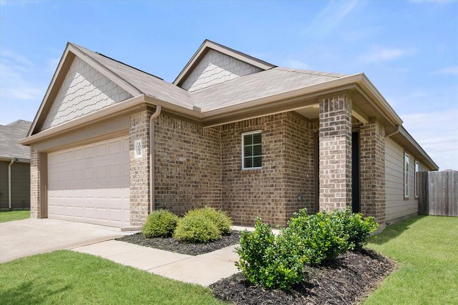 Front exterior of a new home in Deer Creek, Fort Worth, TX, highlighting curb appeal (Image 23).