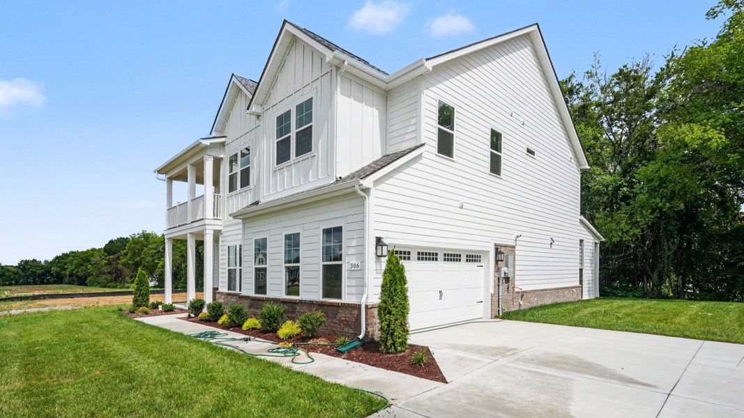 Front exterior of a new home in Northridge Park, Murfreesboro, TN, highlighting curb appeal (Image 23). Front exterior of a new home in Northridge Park, Murfreesboro, TN, highlighting curb appeal (Image 23).