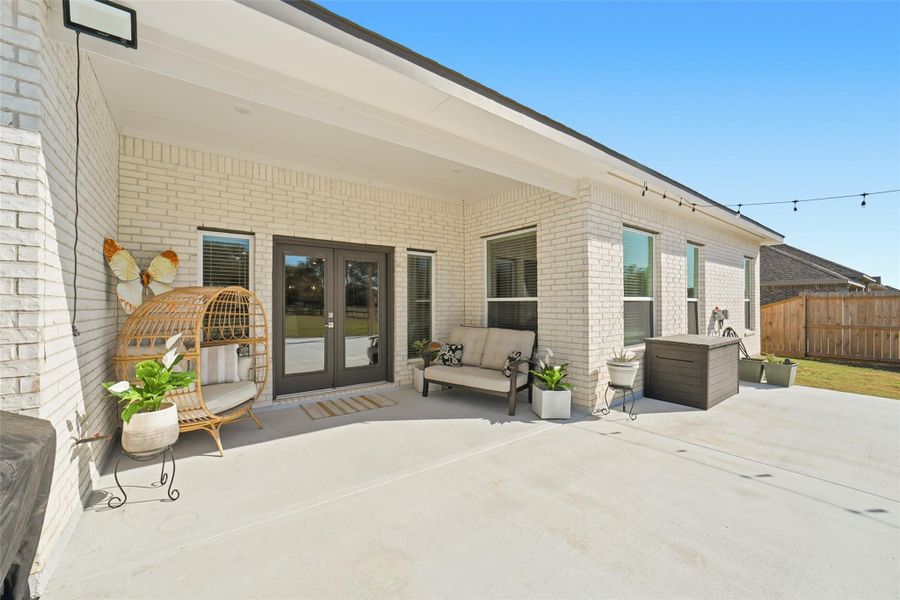 Exterior details and patio area of a home in Tejas Landing, Needville (Image 3).