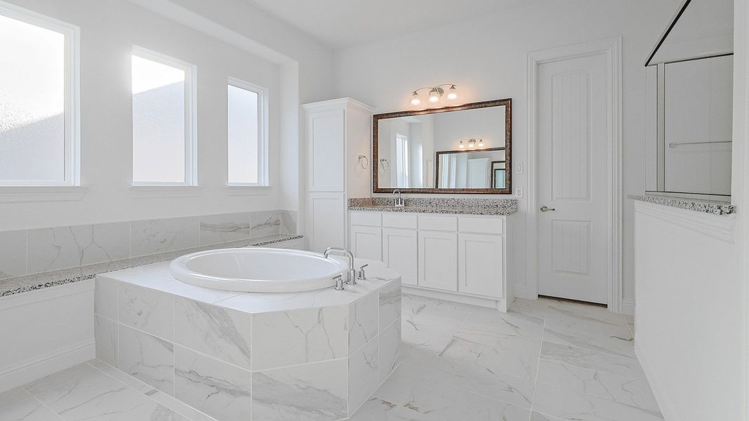 Representative furnished interior of a home built from the Villanova by DRB Homes in Brookewater, Rosenberg (Image 10).