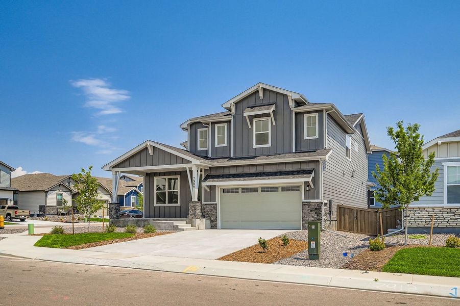 Front exterior of a new home in Sterling Ranch 50s, Colorado Springs, CO, highlighting curb appeal (Image 2).