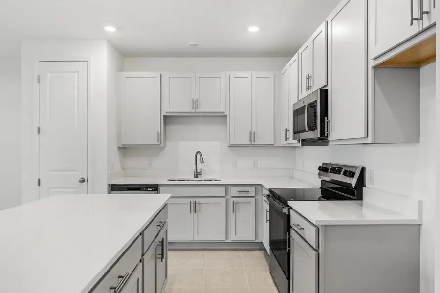 Furnished interior view inside a new home in Catamaran Cove, Rockledge (Image 9).