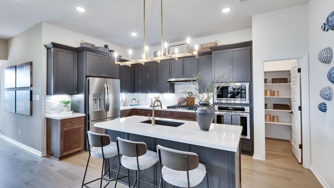 Model home photos of similar floorplans, not pictures of actual home.