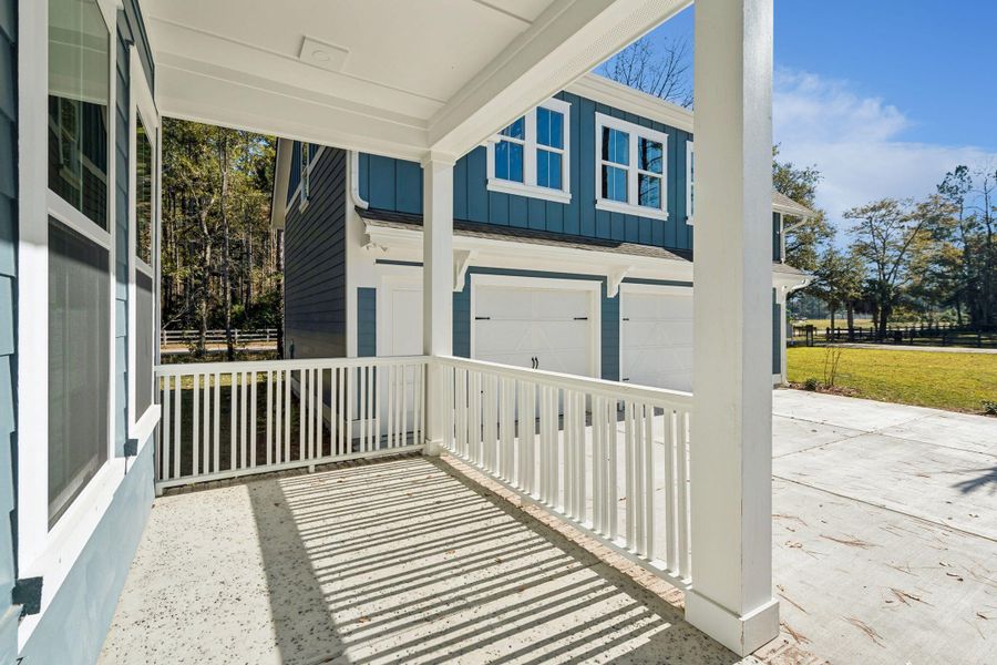 Exterior details and patio area of a home in , Awendaw (Image 38).