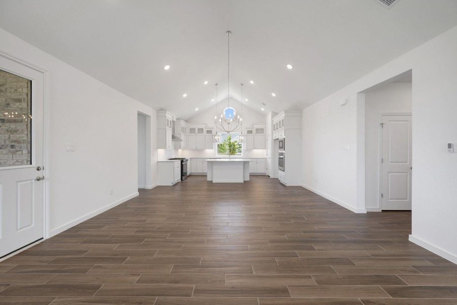 Bright and airy living area with high vaulted ceilings