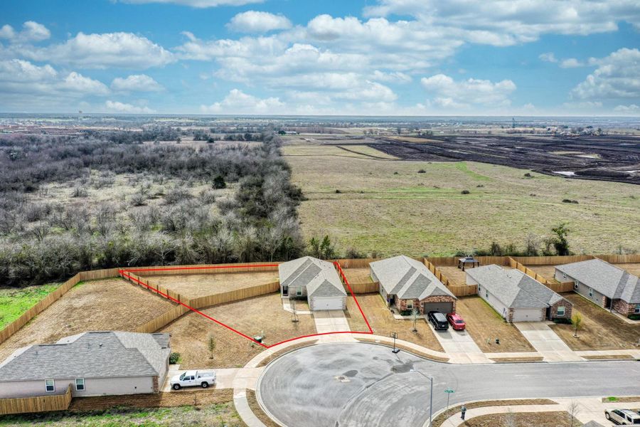 Aerial photo facing the property showing the approximate property lines.