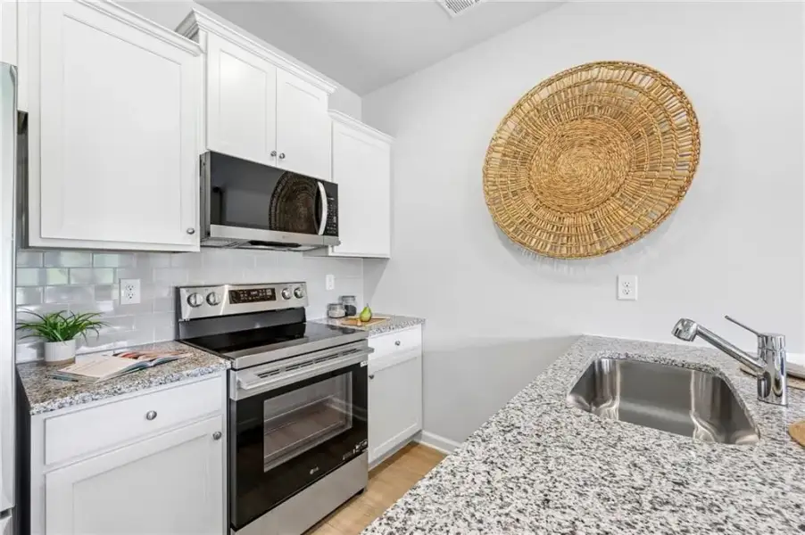 Furnished interior view inside a new home in , Fairburn (Image 9).