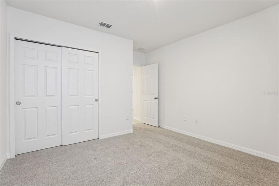 Spacious, unfurnished interior of a new home in Lake Deer Estates - Signature Series, Poinciana (Image 25).