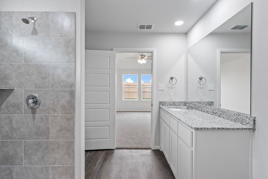 Representative furnished interior of a home built from the TAYLOR by D.R. Horton in Faculty Row, Abilene (Image 22).