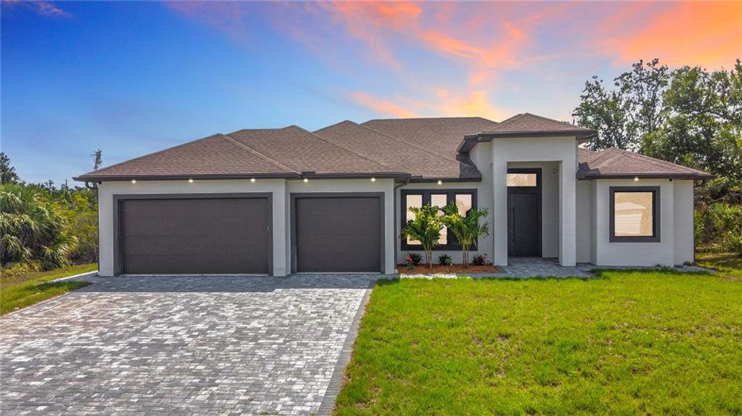 Front exterior of a new home in , Englewood, FL, highlighting curb appeal (Image 23). Front exterior of a new home in , Englewood, FL, highlighting curb appeal (Image 23).