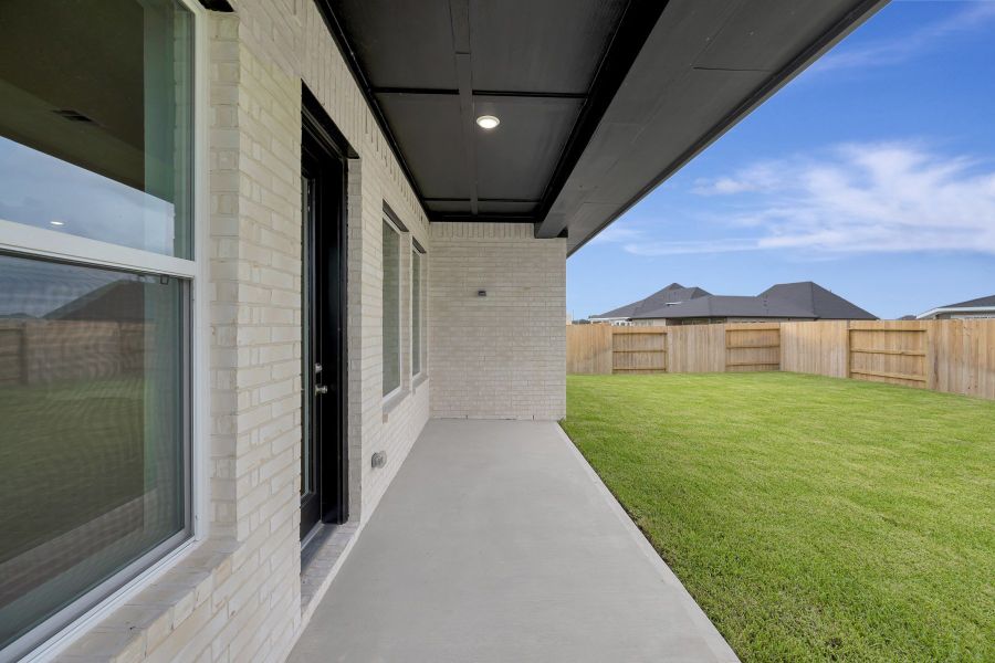 Exterior details and patio area of a home in The Grand Prairie - Retreat Collection, Hockley (Image 4). Exterior details and patio area of a home in The Grand Prairie - Retreat Collection, Hockley (Image 4).