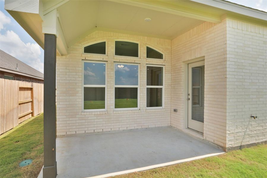 Exterior details and patio area of a home in Creekhaven, Iowa Colony (Image 22). Exterior details and patio area of a home in Creekhaven, Iowa Colony (Image 22).