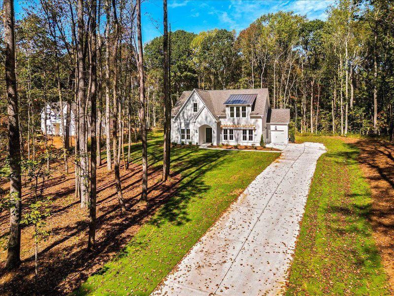 Front exterior of a new home in , Gainesville, GA, highlighting curb appeal (Image 22).