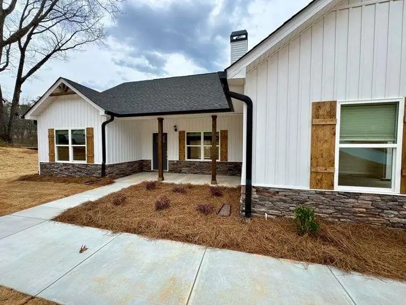 Exterior details and patio area of a home in , Clarkesville (Image 16).