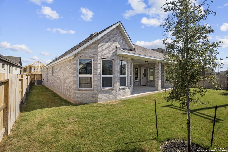 Exterior details and patio area of a home in Stillwater Ranch 60', San Antonio (Image 20).
