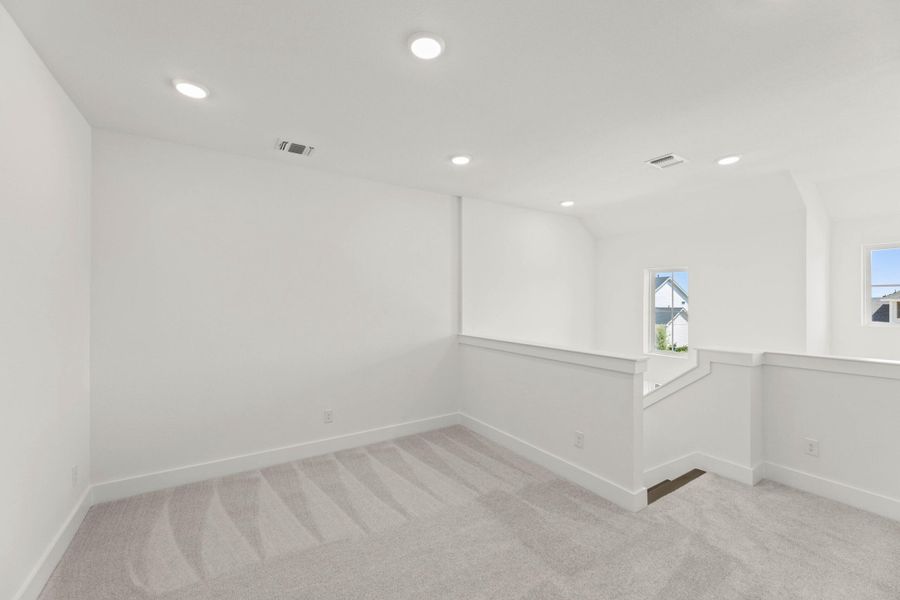 Spacious, unfurnished interior of a new home in Terrace Collection at Harvest, Argyle (Image 15).