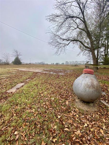 Propane tank and concrete pad Propane tank and concrete pad