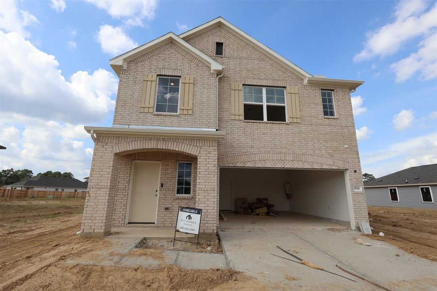 Front exterior of a new home in Indian Springs, Crosby, TX, highlighting curb appeal (Image 17).