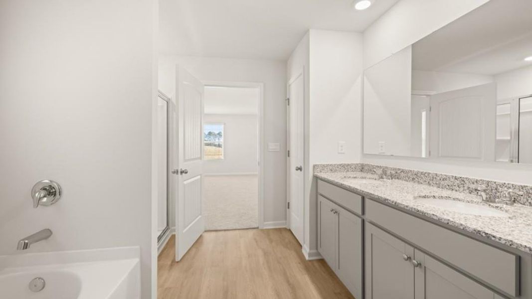 Furnished interior view inside a new home in Northwoods at Mirror Lake, Villa Rica (Image 8).