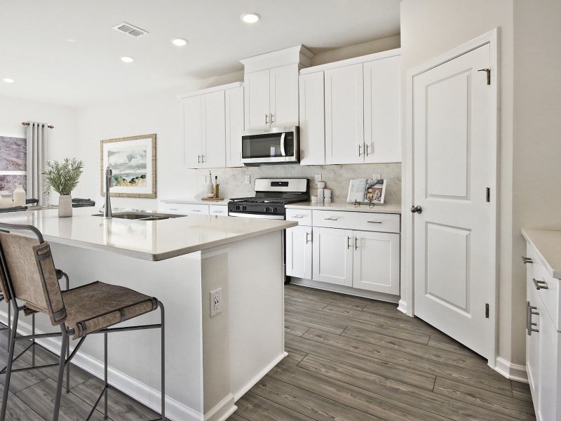 Furnished interior view inside a new home in The Coves at Lakes of Cane Bay II, Summerville (Image 4).