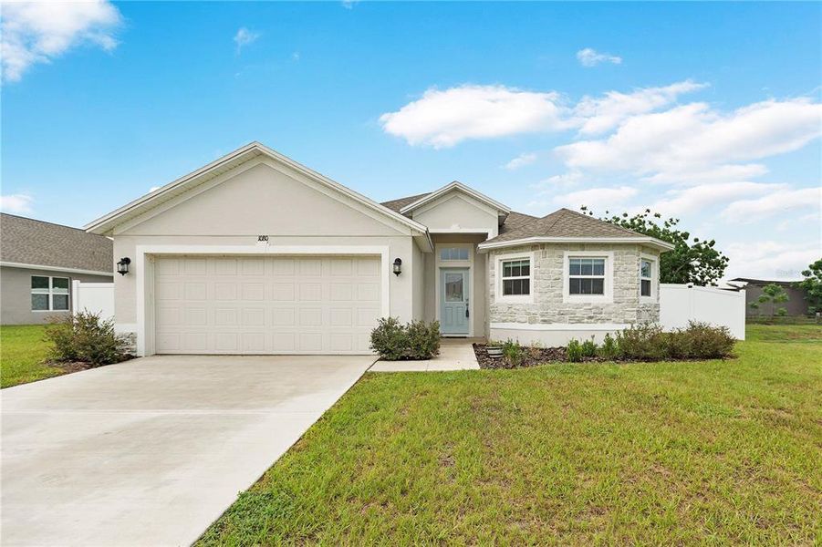 Front exterior of a new home in Sand Lake Groves, Bartow, FL, highlighting curb appeal (Image 1). Front exterior of a new home in Sand Lake Groves, Bartow, FL, highlighting curb appeal (Image 1).