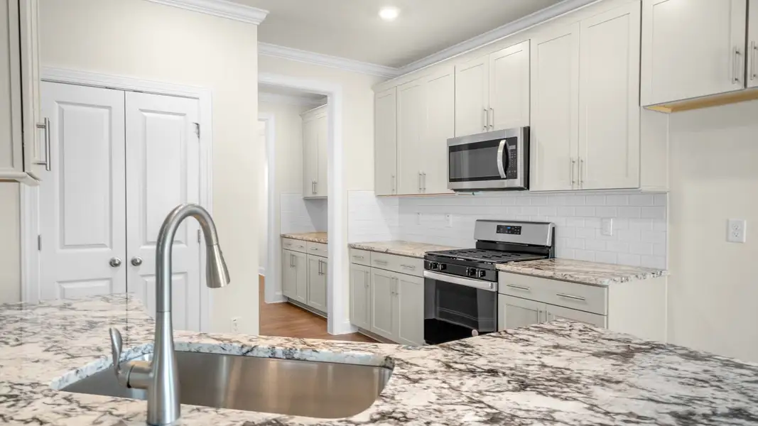 Furnished interior view inside a new home in Collins Ridge, Hillsborough (Image 4).