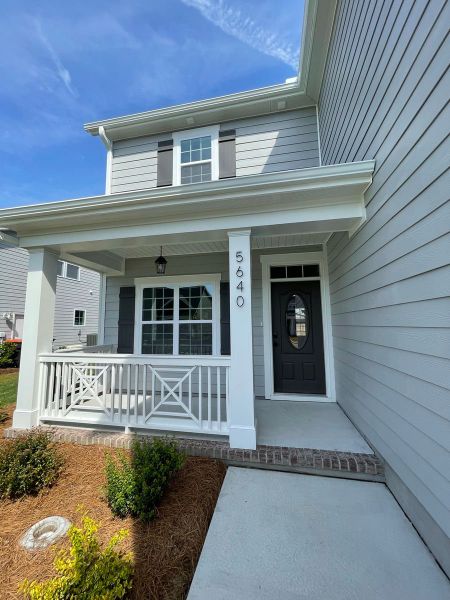 Representative exterior details of a home built from the New Haven by Bill Clark Homes in Carolina Creek, Hampstead (Image 3).