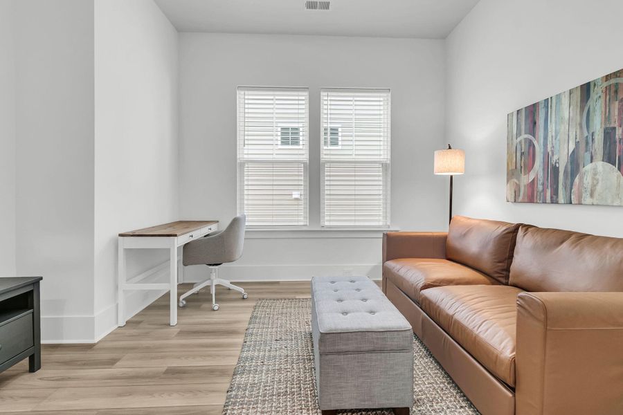 Furnished interior view inside a new home in Summerwind Crossing at Lakes of Cane Bay, Summerville (Image 6).