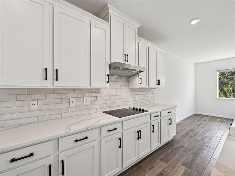 Furnished interior view inside a new home in Oakfield Trails - Premier Series, Parrish (Image 7).