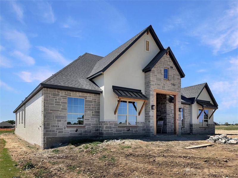 In-progress construction of a new home in The Retreat, Cleburne, TX (Image 7).