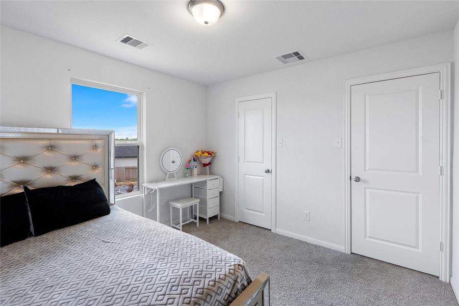 Furnished interior view inside a new home in Sweetgrass Village, Crosby (Image 35).