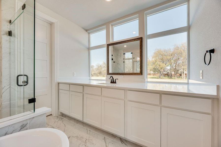 Furnished interior view inside a new home in Dominion of Pleasant Valley, Wylie (Image 6).