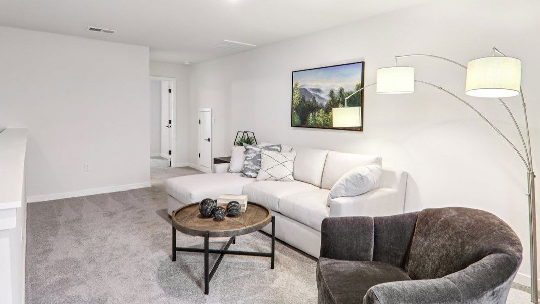 Furnished interior view inside a new home in Reserve at Tap Root Farms, Fletcher (Image 23).