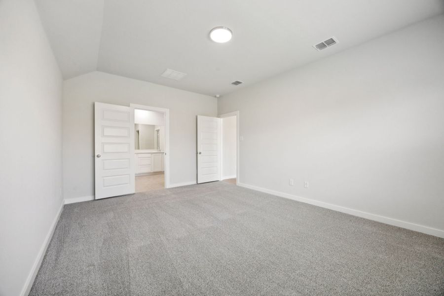 Primary Suite in the Emmy II home plan by Trophy Signature Homes - REPRESENTATIVE PHOTO Primary Suite in the Emmy II home plan by Trophy Signature Homes - REPRESENTATIVE PHOTO