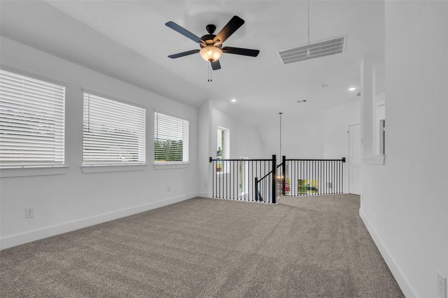 another view of upstairs living space/game room.