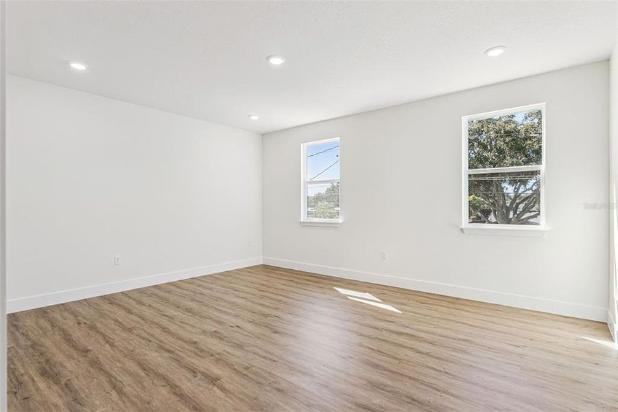 Spacious, unfurnished interior of a new home in , Belle Isle (Image 27).