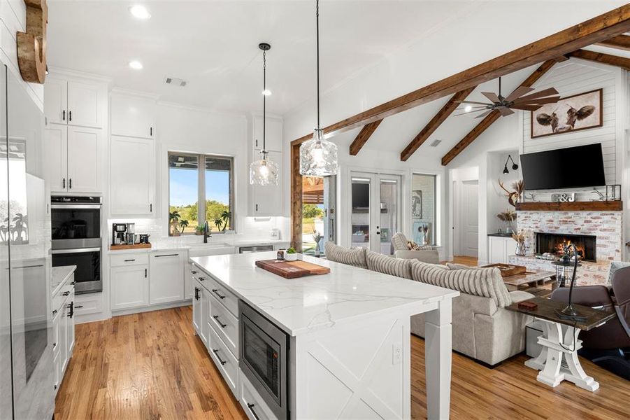 Open floorplan perfect for entertaining. Microwave built into island great for kids.