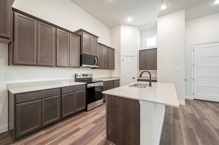 Massive counter-height Island Seating, Water line to Fridge (photo left, not shown)