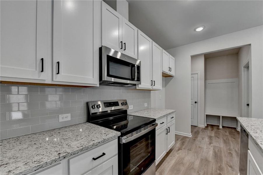 Furnished interior view inside a new home in , Auburn (Image 31).