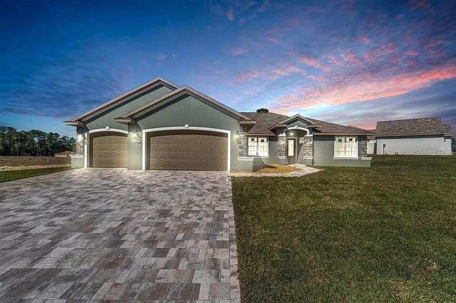 Front exterior of a new home in , Dunnellon, FL, highlighting curb appeal (Image 2). Front exterior of a new home in , Dunnellon, FL, highlighting curb appeal (Image 2).
