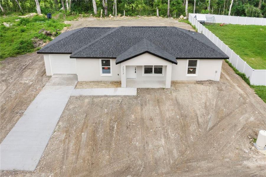 Exterior details and patio area of a home in , Summerfield (Image 10).