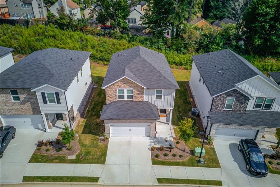 Front exterior of a new home in Sweetwater Green - Royal Series, Lawrenceville, GA, highlighting curb appeal (Image 19).
