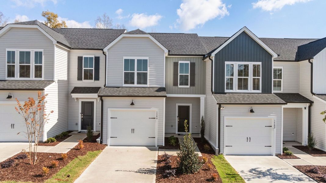 Front exterior of a new home in Flemingfield, Greensboro, NC, highlighting curb appeal (Image 19).