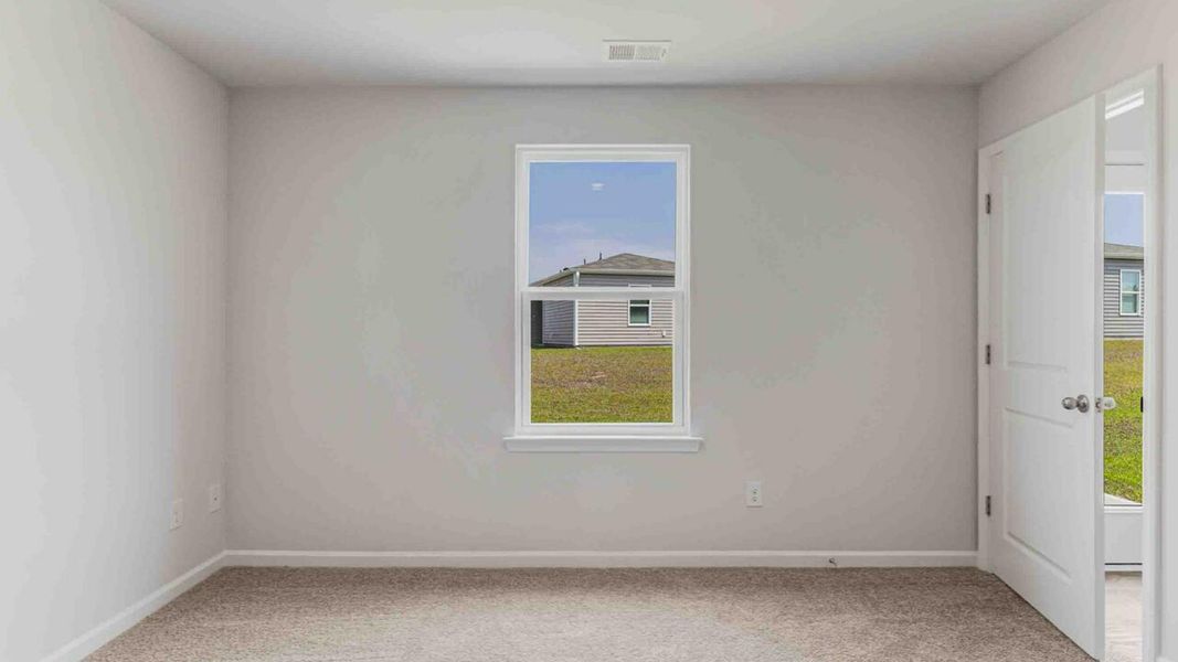 Representative unfurnished interior of a home built from the Devon by D.R. Horton in Eagle Creek, Bolivia (Image 15).